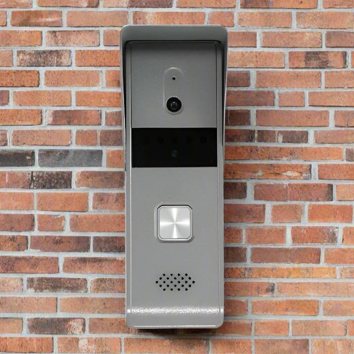 Hikvision DS-KB2421T-IM four-wire video door station installed on a brick wall