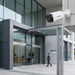 A VIVOTEK bullet security camera with a white body, black protective lens cover, and a white wall mounting bracket, shown on a solid white background.